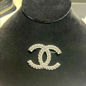 Gorgeous Chanel Black pearl brooch.